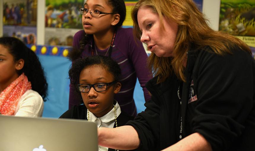Sixth graders Ayshiyon Woods and Jahzara Davis work with Kittrie Glen.